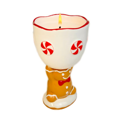 Ceramic gingerbread goblet candle with gingerbread cookie scent and peppermint design on white background.