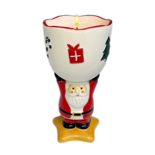 Spiced cranberry cider scented ceramic Santa goblet candle with hand-painted holiday details on a white background.